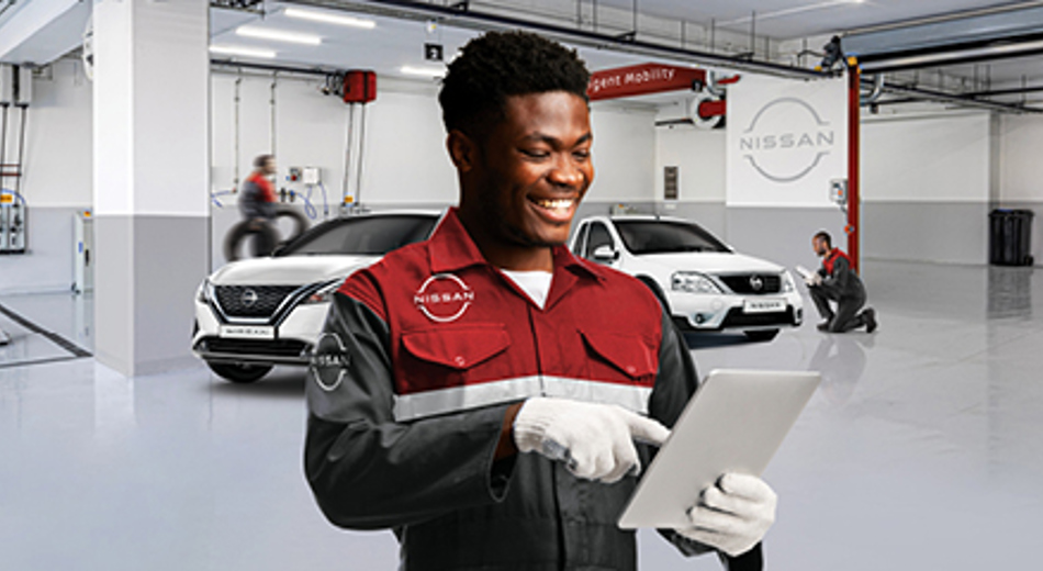 Nissan Technician looking at diagnostics